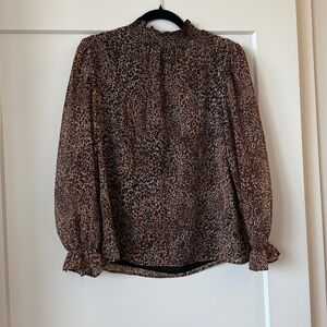 1. State Animal Print Top with Smocked Detail